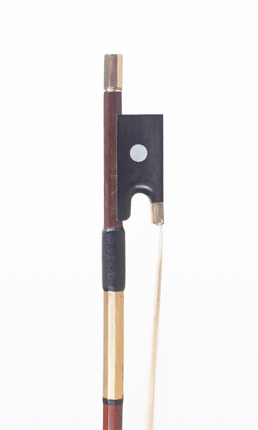 A gold-mounted violin bow, branded Peccatte