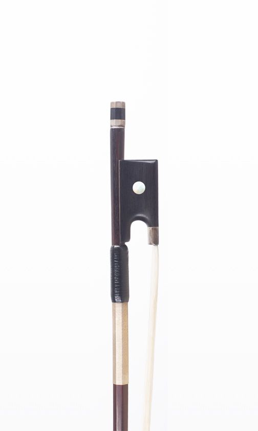 A silver-mounted violin bow, branded Tourte