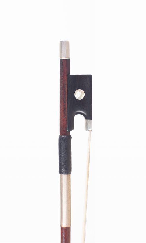 A silver-mounted violin bow, branded Vtor Fetique