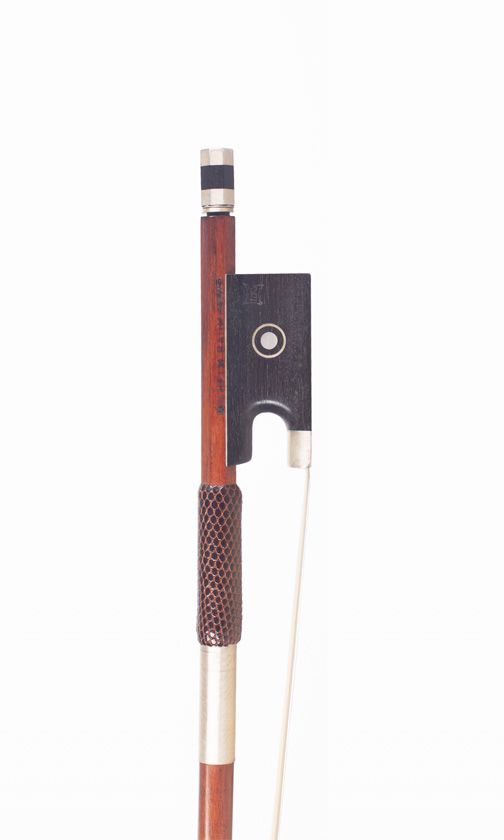 A nickel-mounted violin bow, branded Wilhelm Raum