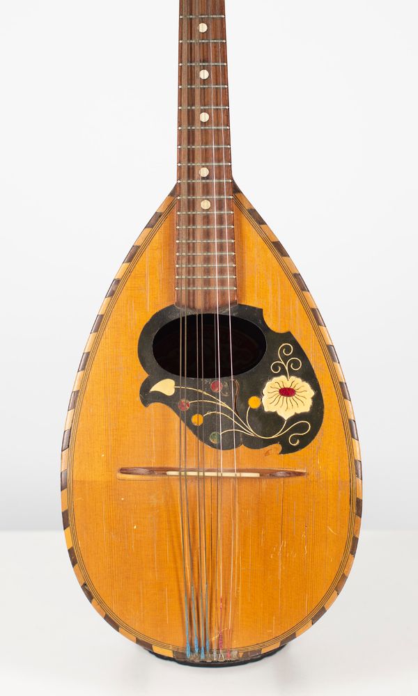 A mandolin, labelled Vincenzo Miroglio & Figli