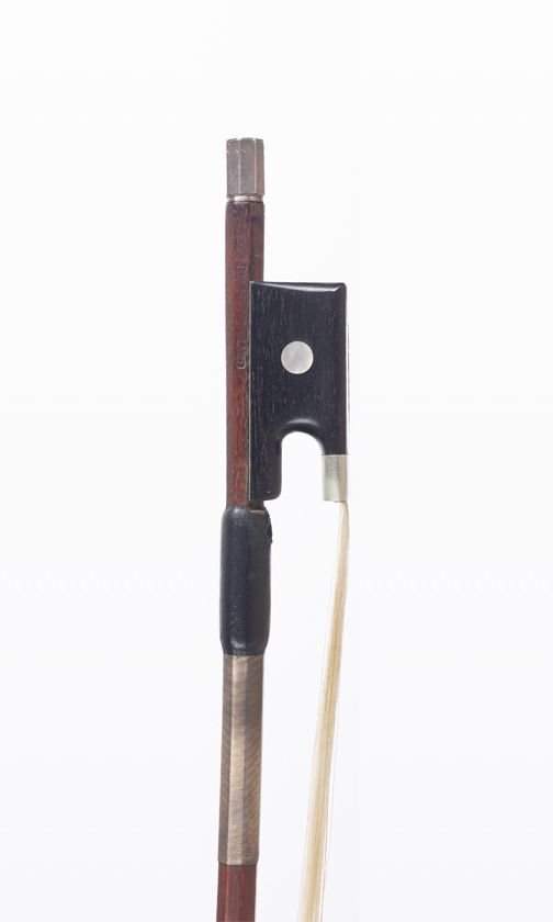 A nickel-mounted violin bow, branded Emile Ouchard