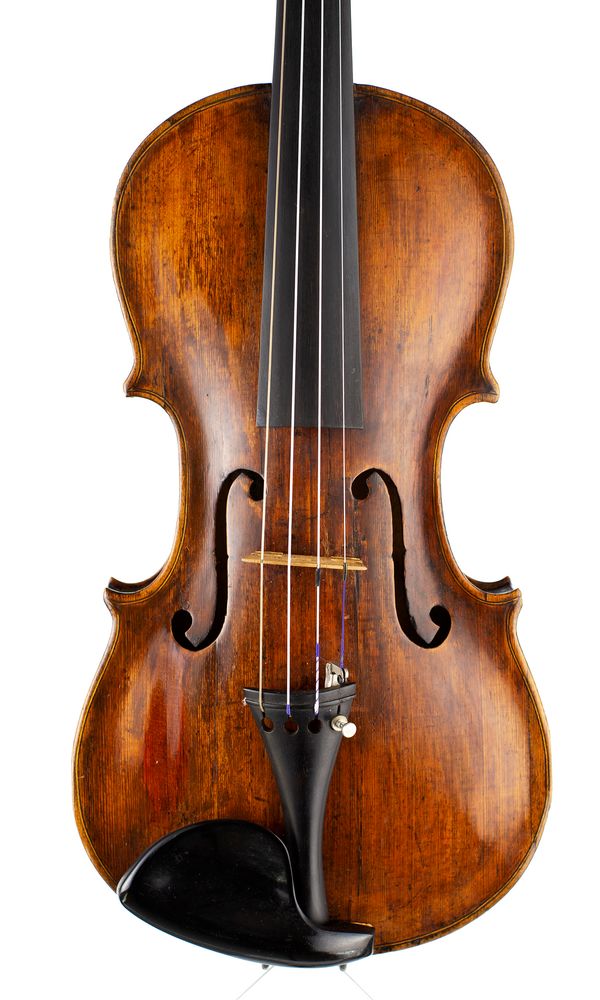 A violin, labelled Bernadus Calcanius