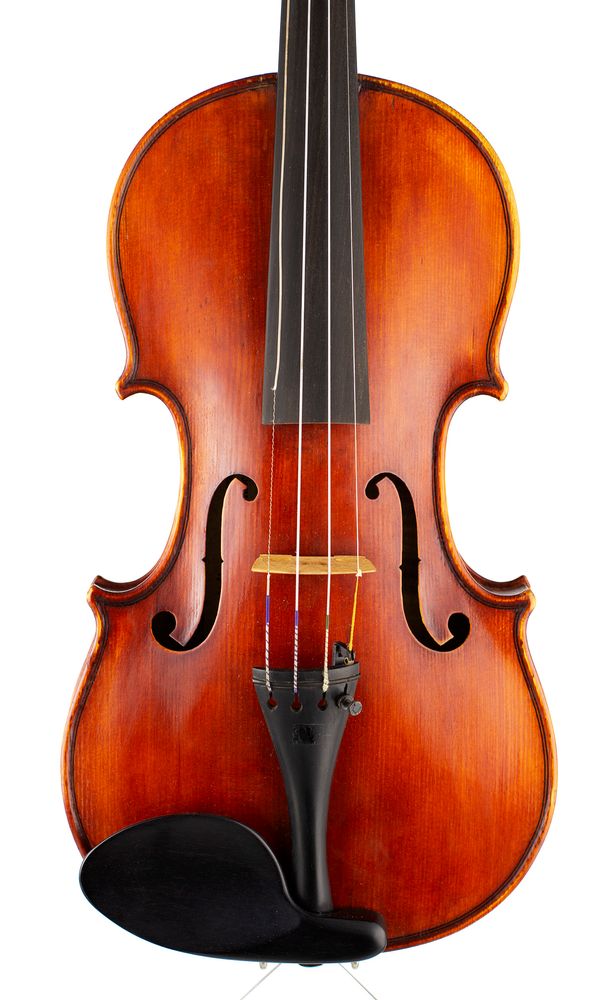 A violin, labelled Riccardo Antoniazzi