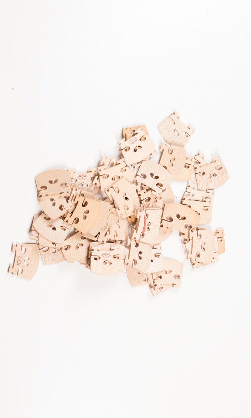 Sixty full size violin bridges