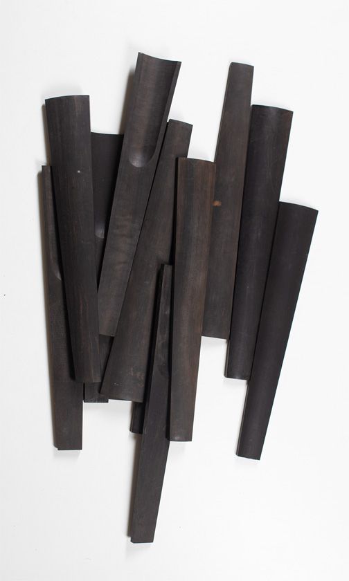 Twelve violin fingerboards