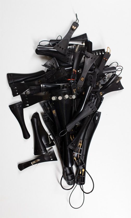 Five cello tailpieces and forty-five violin tailpieces