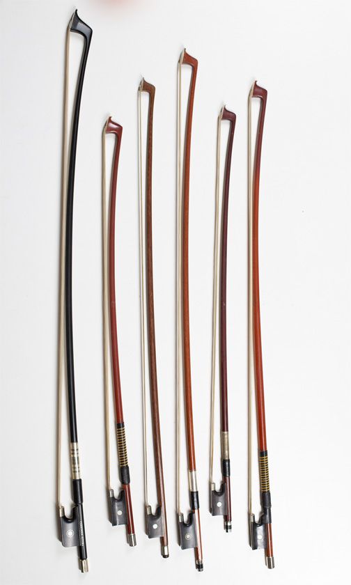 Five child's violin bows and one cello bow
