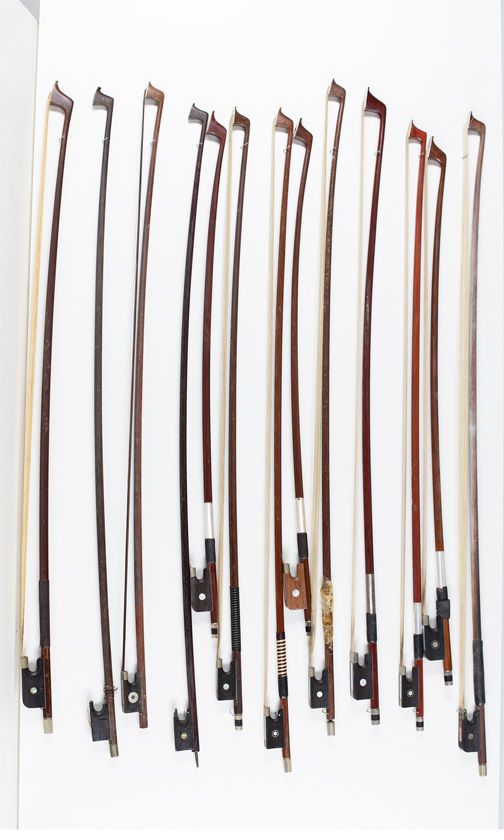 Eleven violin bows, five child's violin bows, three cello bows and one child's cello bow, various sizes