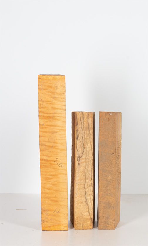 Three maple violin neck blanks