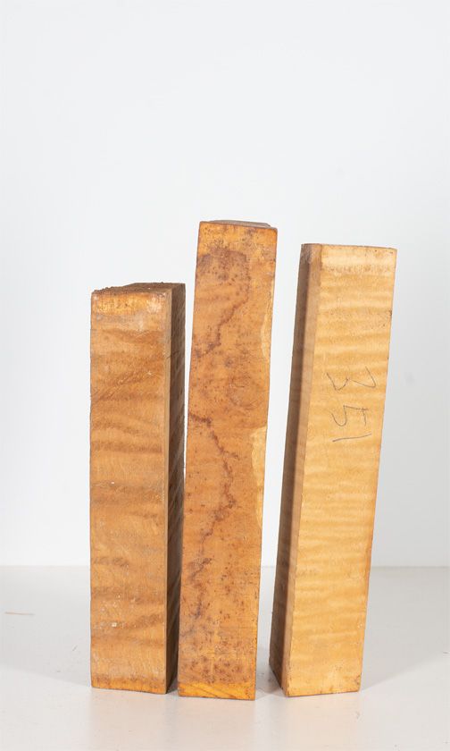 Three maple violin neck blanks