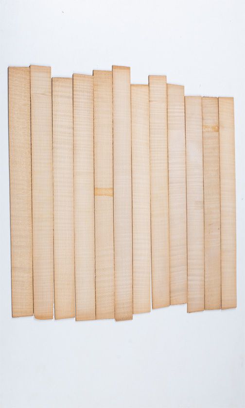 Twelve maple violin rib blanks