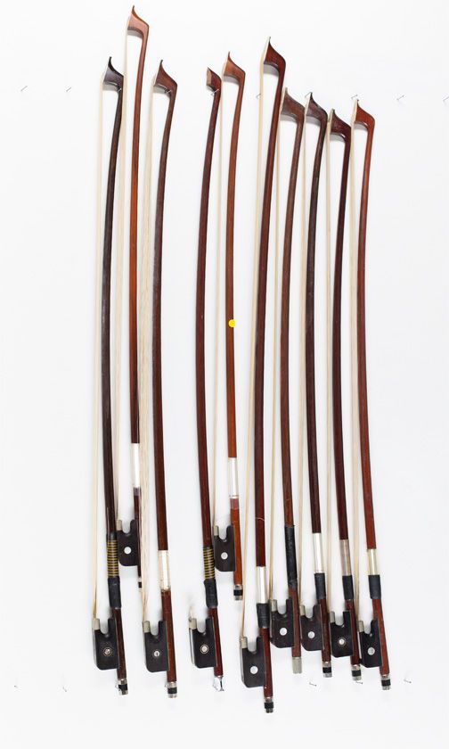 One cello bow and nine child's cello bows, various sizes