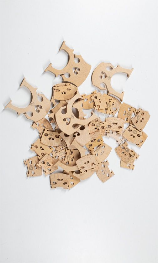 Seven cello bridges and thirty-three violin bridges, various sizes