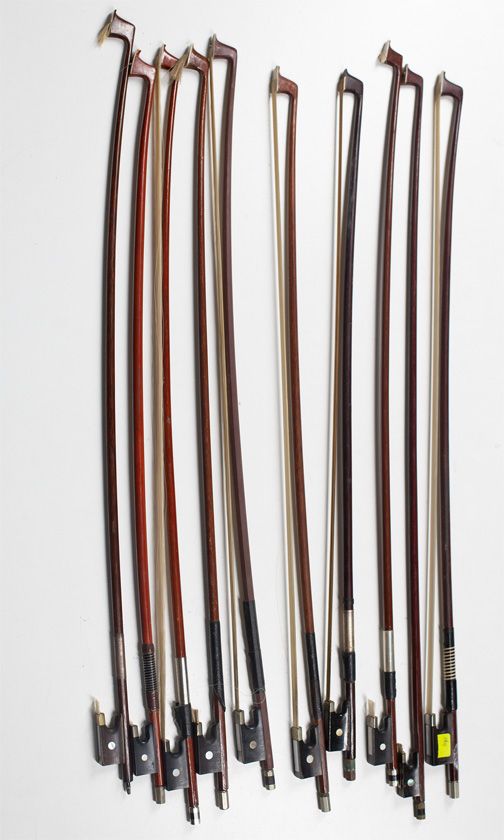 Ten child's violin bows, various sizes