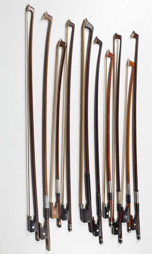 Ten child's violin bows, various sizes