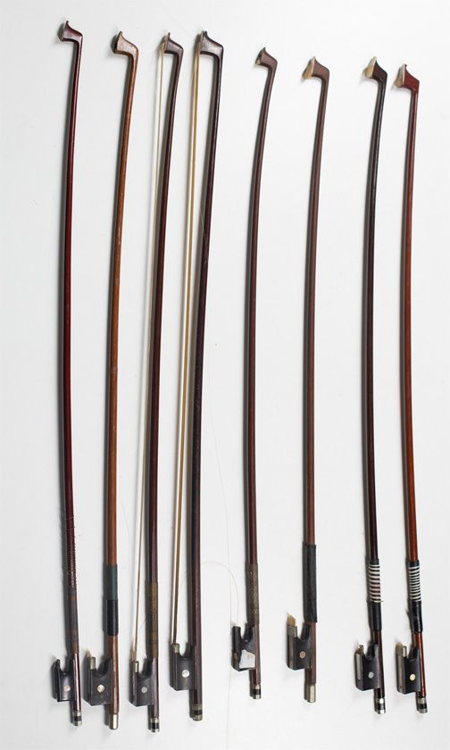 Eight child's violin bows, various sizes