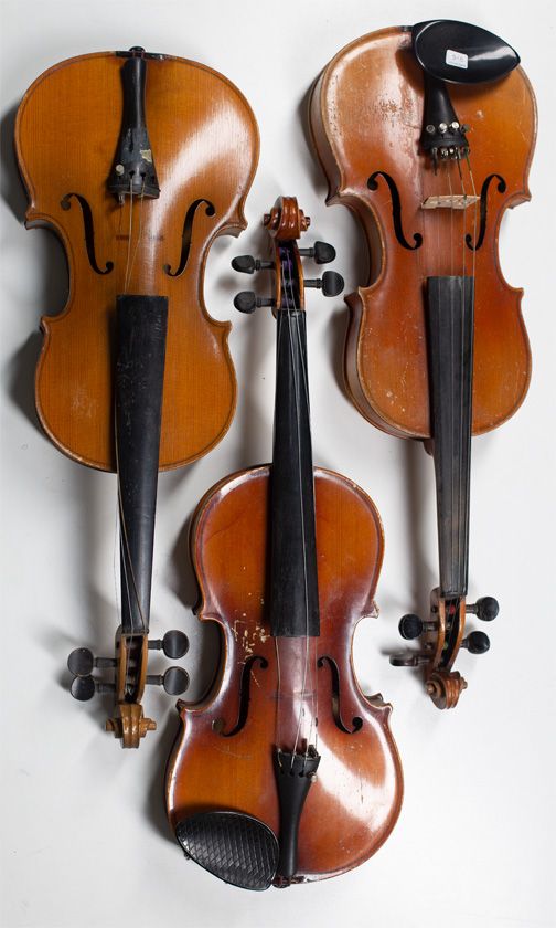 Three child's violins