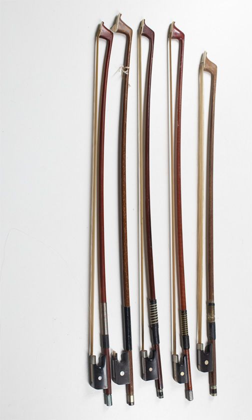 Five child's cello bows, various sizes