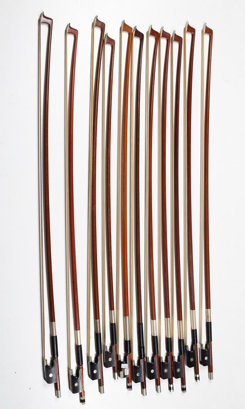 Eleven viola bows