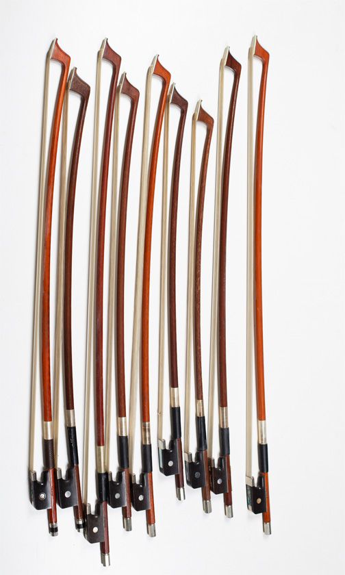 Two cello bows and seven child’s cello bows