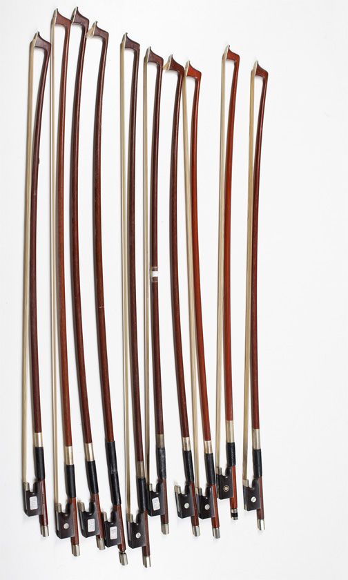 Four 3/4 size violin bows and six 1/2 size violin bows