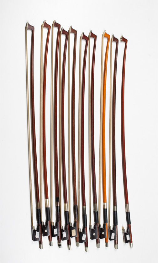 Ten 1/2 size violin bows