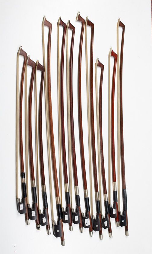 Eleven child’s cello bows, varying lengths