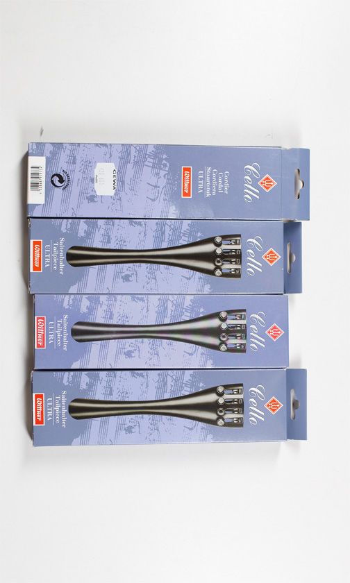 Four 3/4 size cello tailpieces