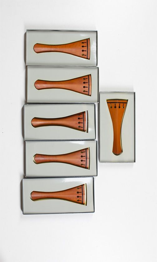 Twenty violin tailpieces, various sizes