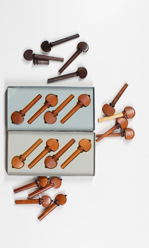 Five sets of violin pegs