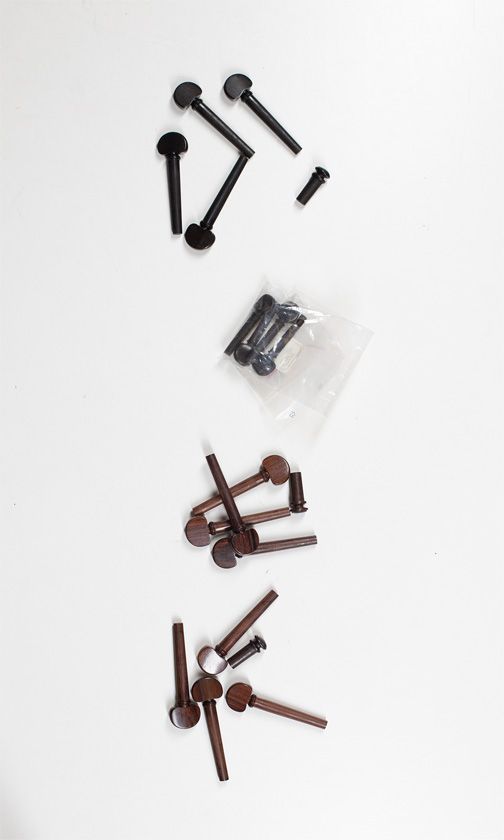 Four sets of violin pegs