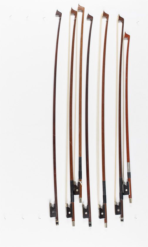 Seven child's violin bows