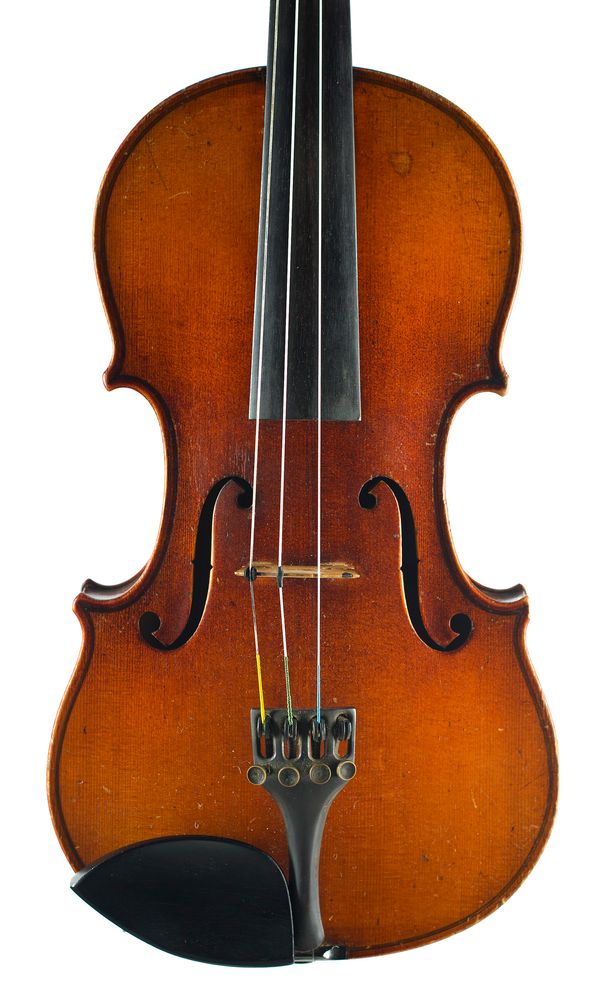 A violin, labelled Schuster