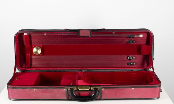 A violin case, branded Bein & Fushi