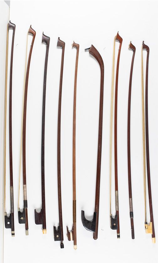 Eight cello bows and one bass bow, various sizes