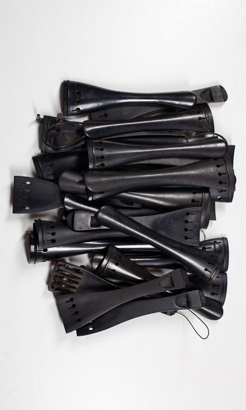 Thirty cello tailpieces