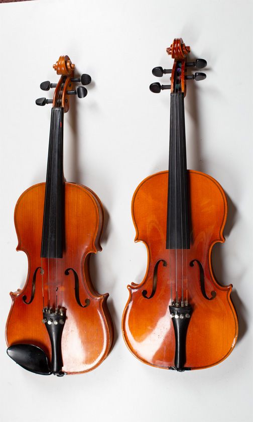 Three child's violins