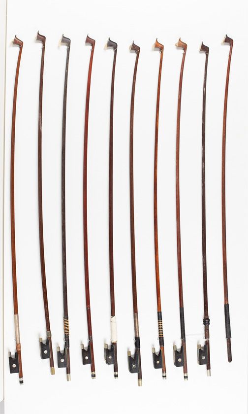 Twenty violin bows