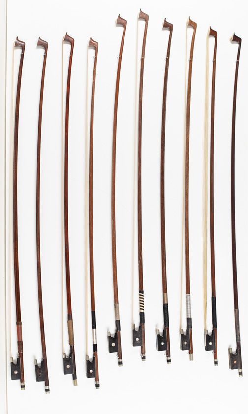 Twenty violin bows