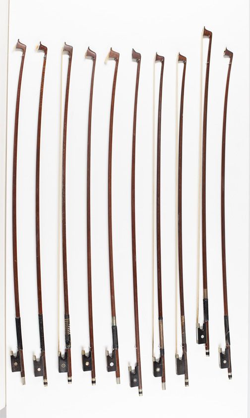Twenty violin bows
