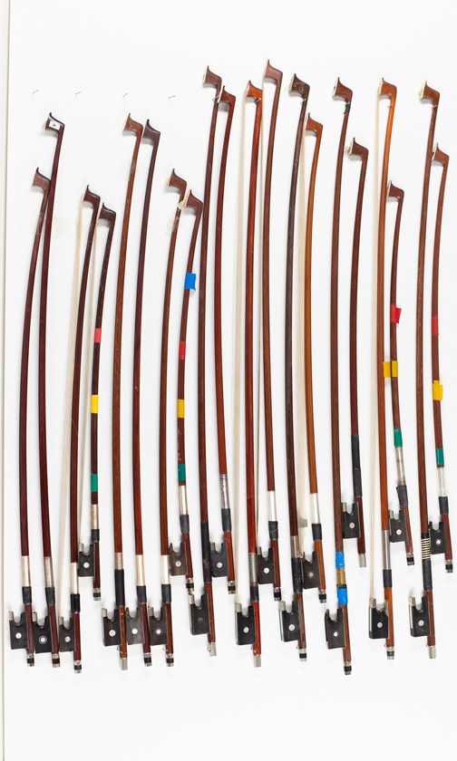 Twenty violin bows, various sizes