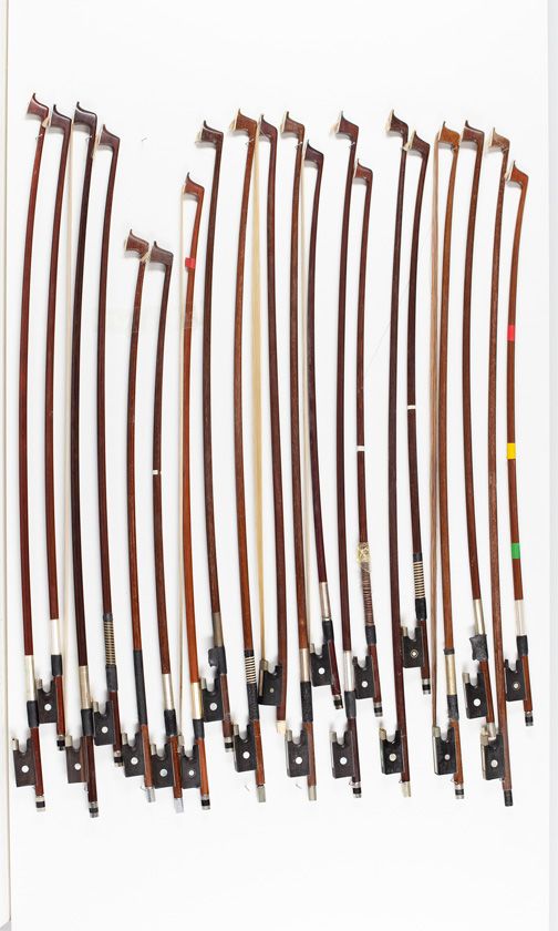 Twenty violin bows, various sizes
