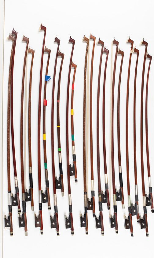 Twenty violin bows, various sizes