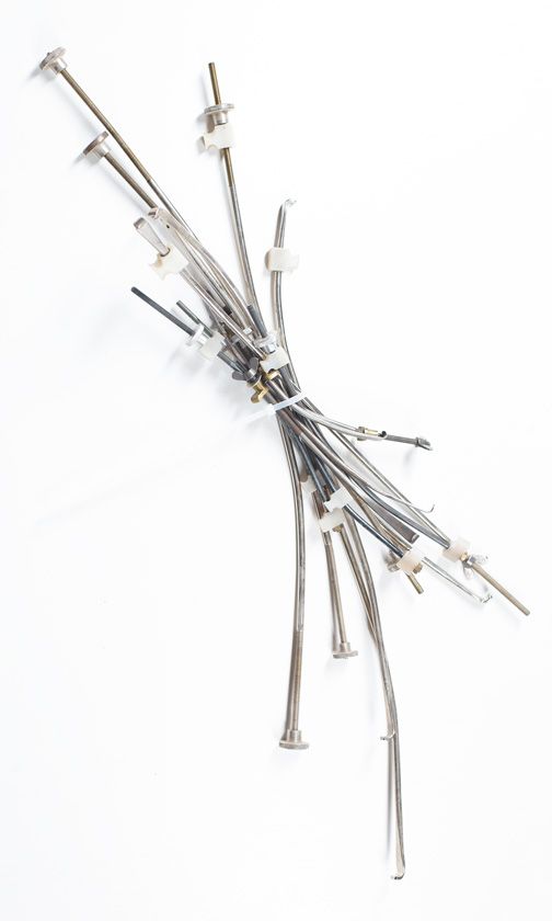 Seven cello crack clamps and eight violin crack clamps