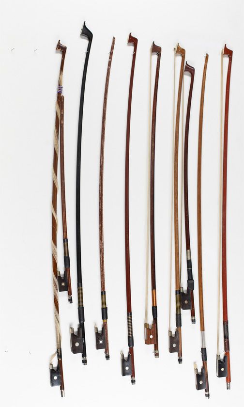 Four violin bows, four child's violin bows and one cello bow, various sizes