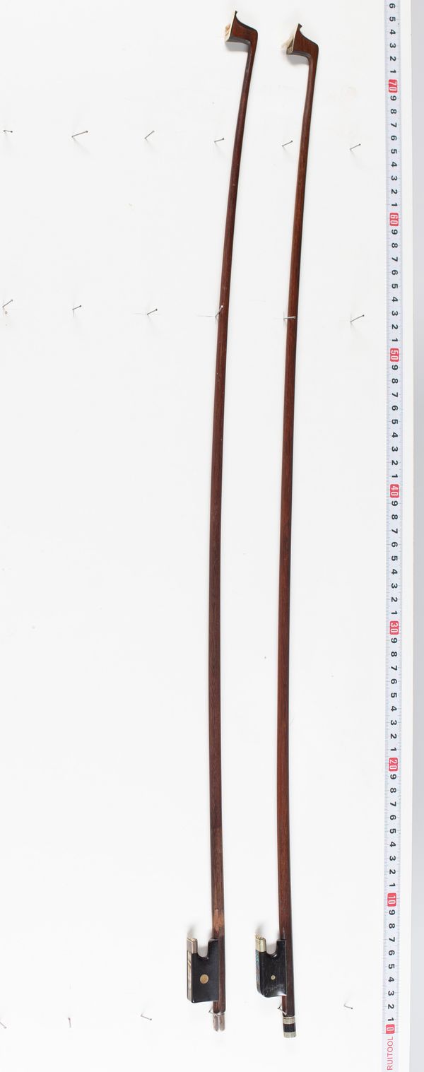 Two violin bows, varying lengths