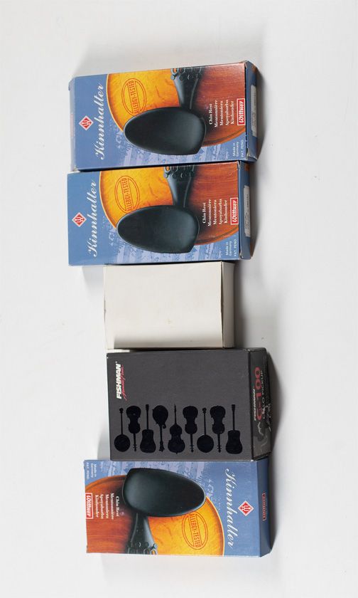 Four chin rests, various sizes