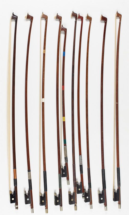 Ten child's violin bows