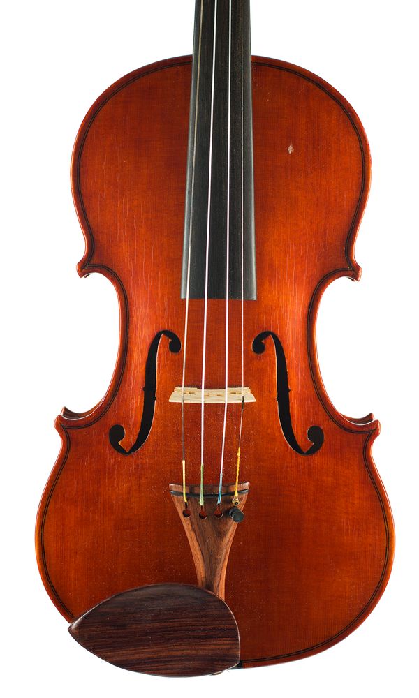 A violin, labelled Margaret Eileen Brindley